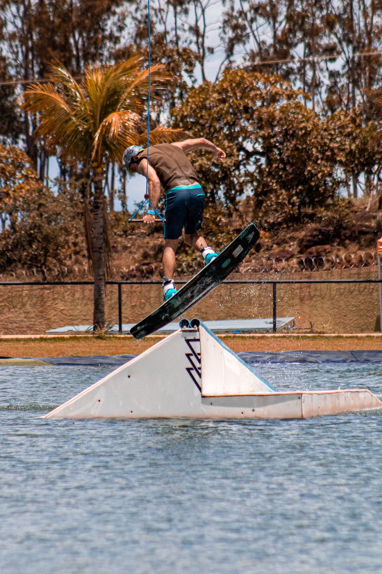 Rider launching off a wake park feature